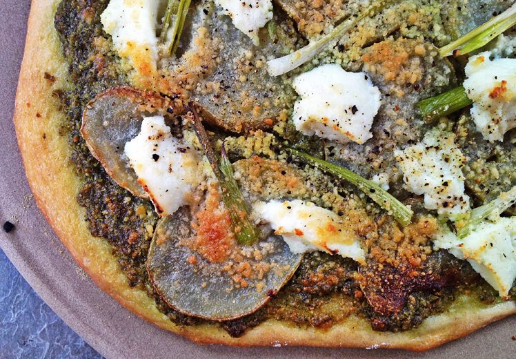 potato pizza with arugula-garlic scape pesto