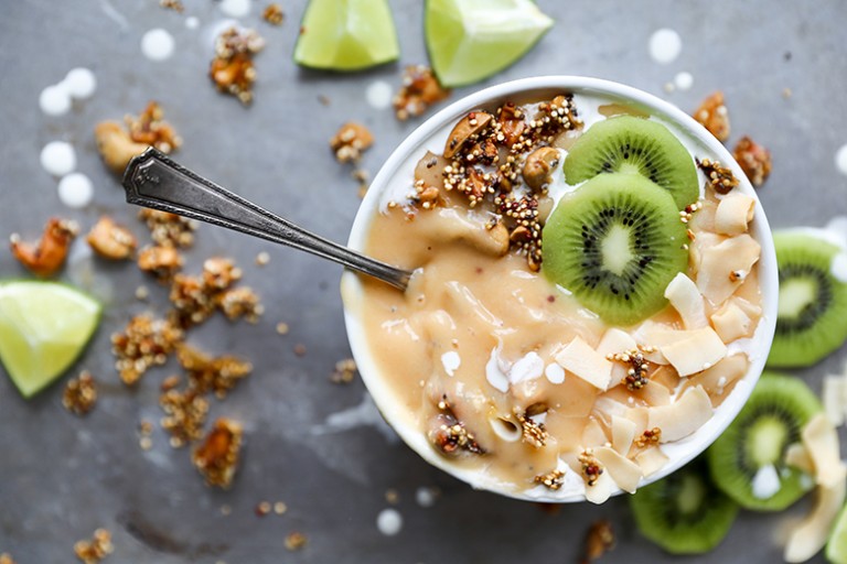 PapayaLime Smoothie Bowl with Toasted CashewQuinoa Cereal Floating