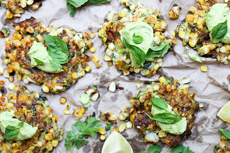 sweet corn and squash fritters with avocado crema