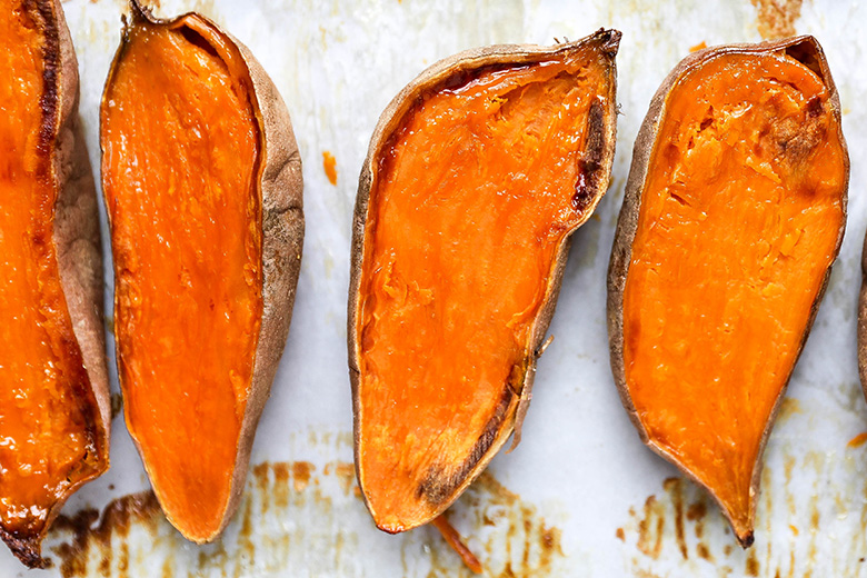 Baked Sweet Potatoes with Garlicky Kale and Almond Butter | www.floatingkitchen.net