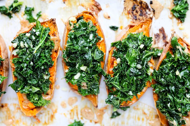 Baked Sweet Potatoes with Garlicky Kale and Almond Butter