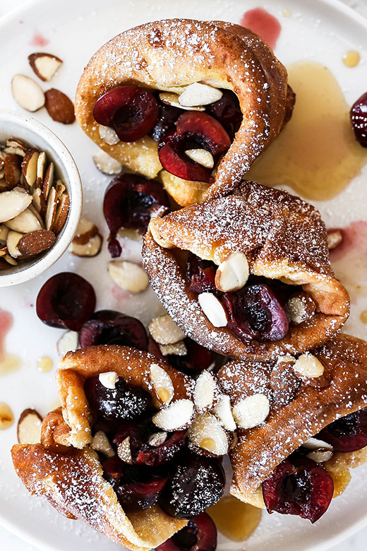 Mini Bourbon-Soaked Cherry and Almond Dutch Baby Pancakes | www.floatingkitchen.net