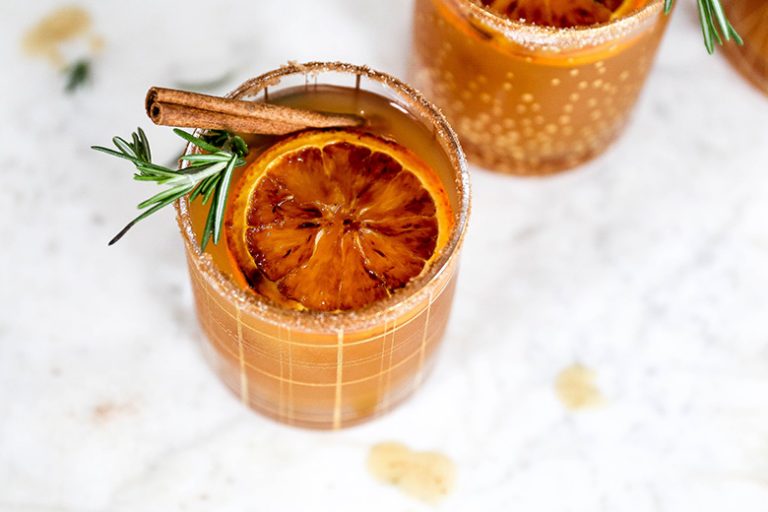 Apple Cider, Bourbon and Amaretto Cocktails with Brûléed Oranges