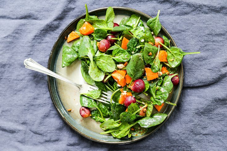 Warm Spinach Salad with Roasted Grapes and Sweet Potatoes