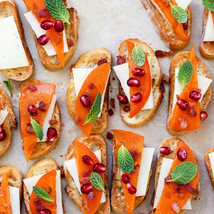 Persimmon Crostini with Manchego, Crispy Pancetta and Pomegranate | www.floatingkitchen.net