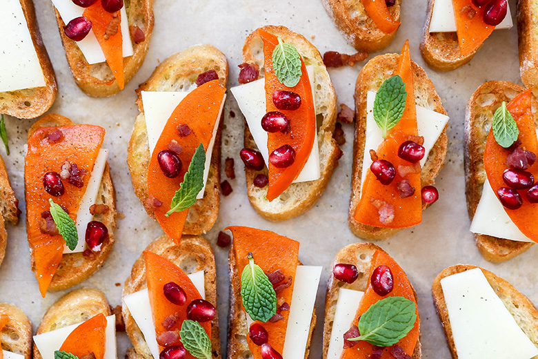 Persimmon Crostini with Manchego, Crispy Pancetta and Pomegranate | www.floatingkitchen.net