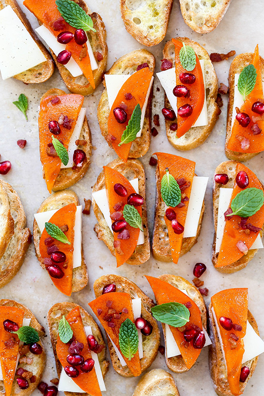 Persimmon Crostini with Manchego, Crispy Pancetta and Pomegranate | www.floatingkitchen.net