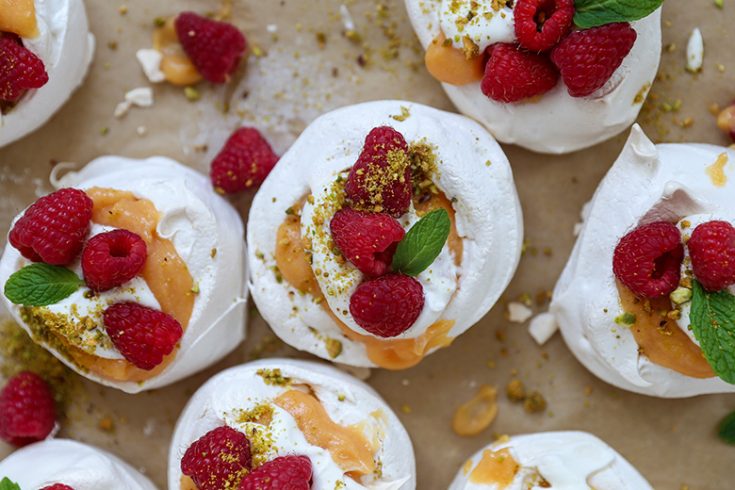 Pistachio Pavlovas with Papaya Curd and Fresh Raspberries